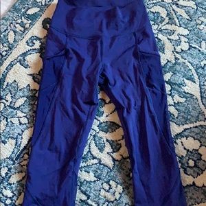 Lulu lemon running leggings size 4. Royal purple